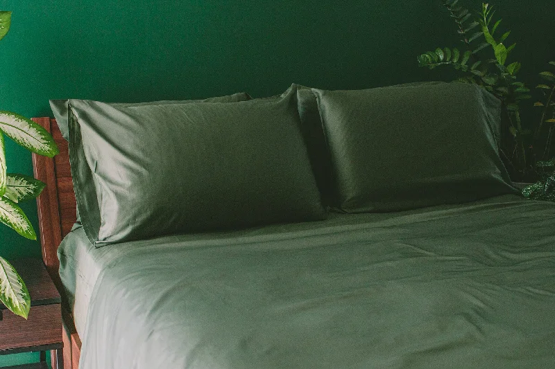 Moisture - Wicking Cotton Sheets for a Dry and Comfortable SleepNest Bedding® Sateen Organic Cotton Sheet Set + Pillowcases Moisture - Wicking Cotton Sheets for a Dry and Comfortable SleepNest Bedding® Sateen Organic Cotton Sheet Set + Pillowcases