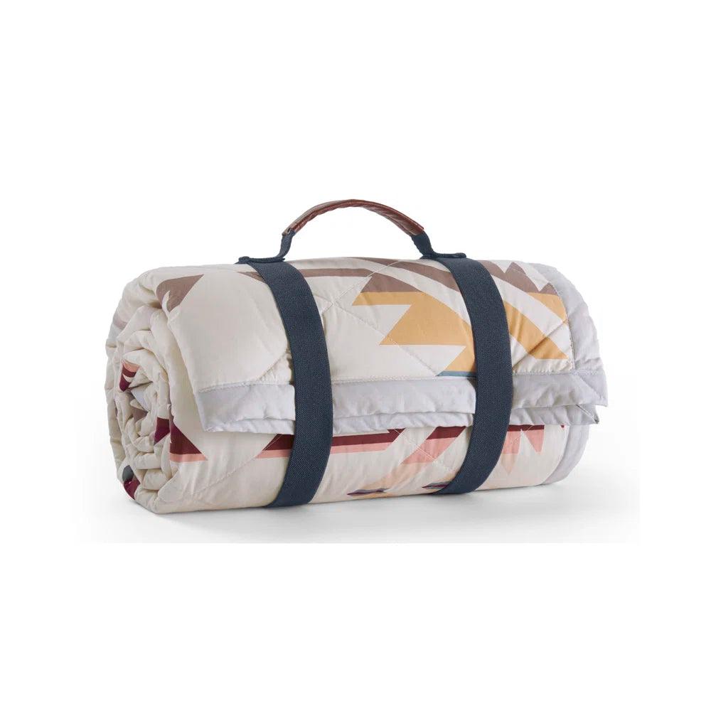 Moisture - wicking athletic performance blankets​Shifting Dunes Quilted Roll-Up Throw