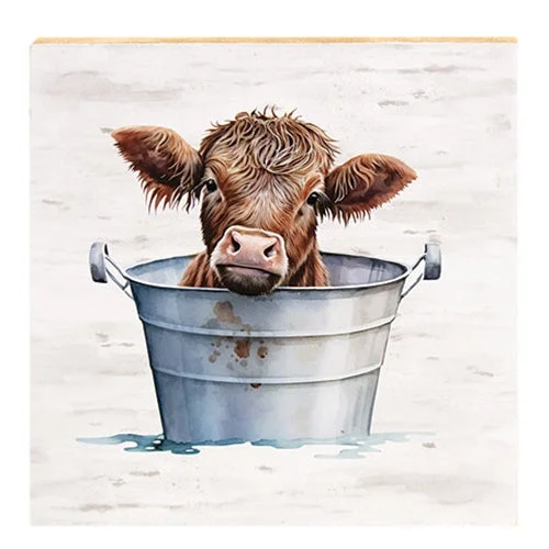 Bed skirts with a multi - colored patternBaby Highland Cow in a Bucket Block