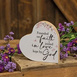 Bed skirts with a geometric cut - out designFounded on Faith Heart Block