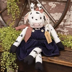 Bed skirts with a jacquard weave for a textured lookWilma Cow Doll