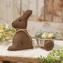 Bed skirts with a geometric print for a modern aestheticPrimitive Stuffed Bunny w/Egg Cart